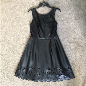 Faux leather dress with laser cutouts